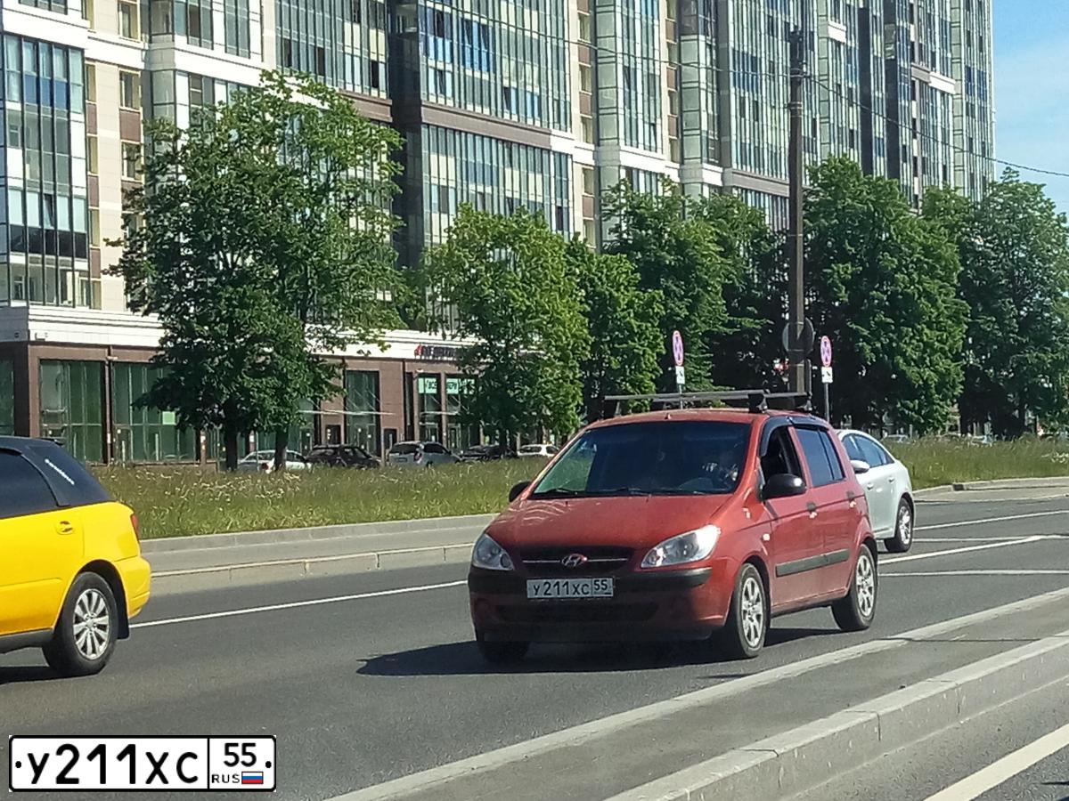Фото автомобиля HYUNDAI GETZ, 2008 — госномер У211ХС55. Цвет: Красный