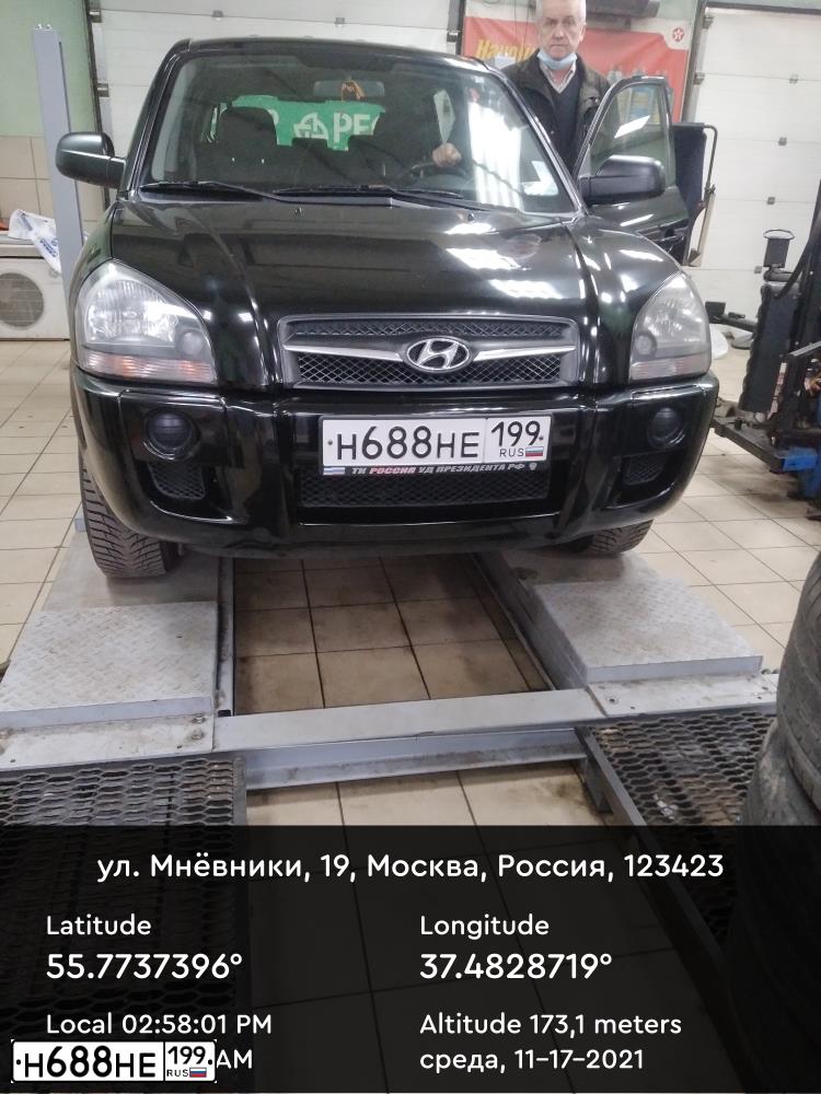 Фото автомобиля HYUNDAI TUCSON, 2008 — госномер Н688НЕ199. Цвет: ЧЕРНЫЙ