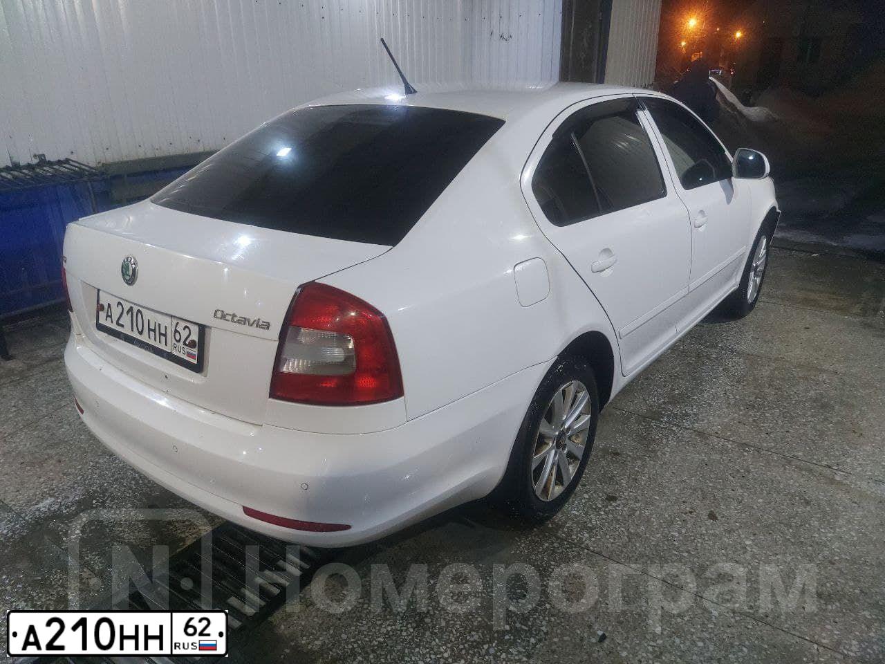 Фото автомобиля SKODA OCTAVIA, 2011 — госномер А210НН62. Цвет: Белый