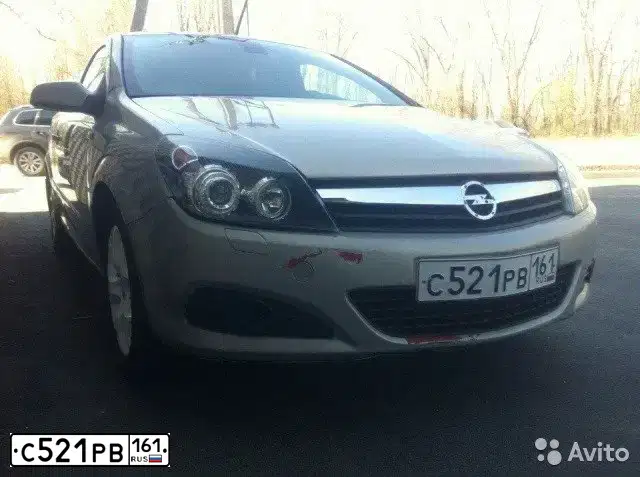 Фото автомобиля OPEL ASTRA, 2006 — госномер С521РВ161. Цвет: БЕЖЕВЫЙ