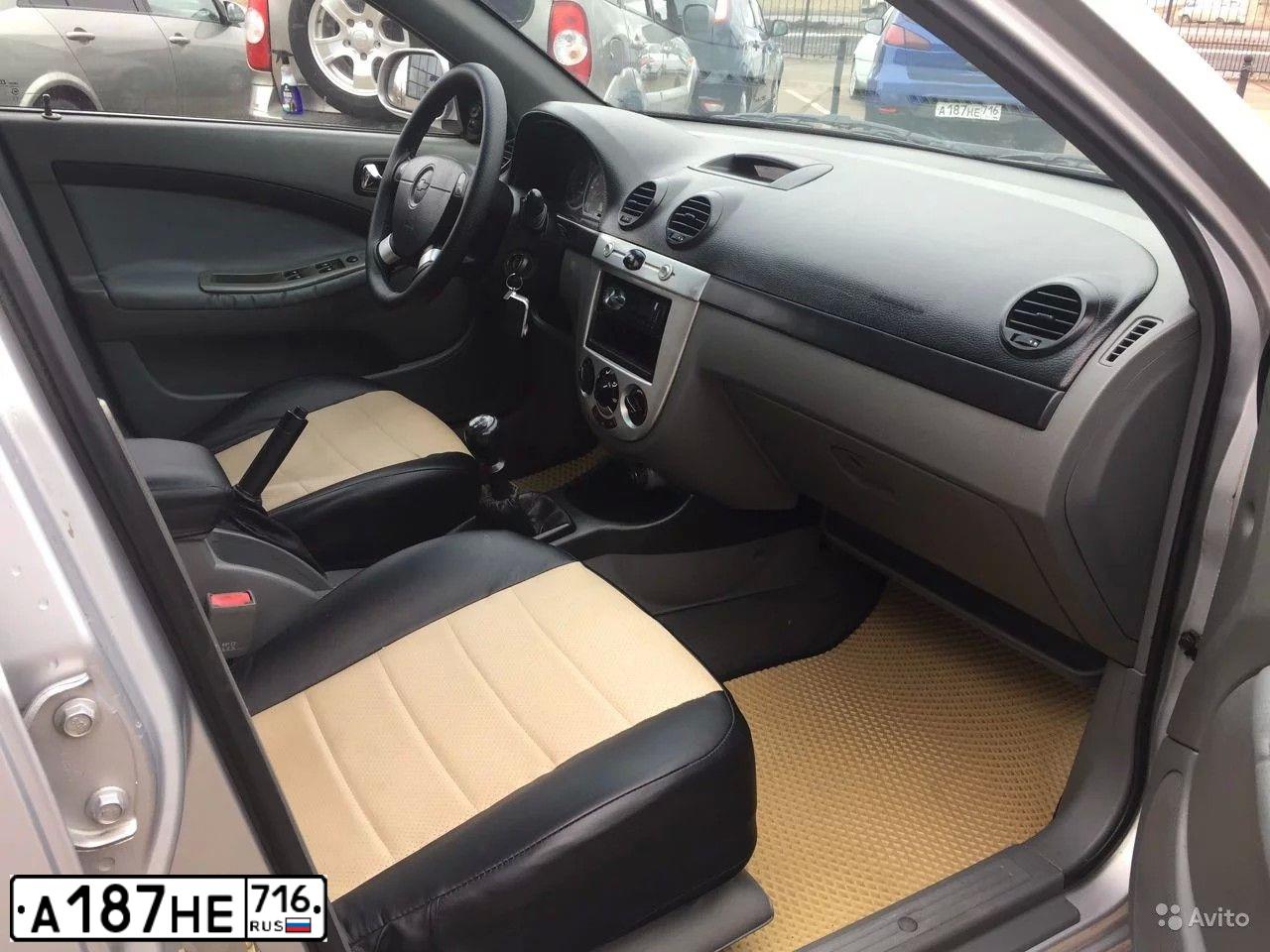 Фото автомобиля MITSUBISHI COLT, 2009 — госномер Е157КМ716. Цвет: синий