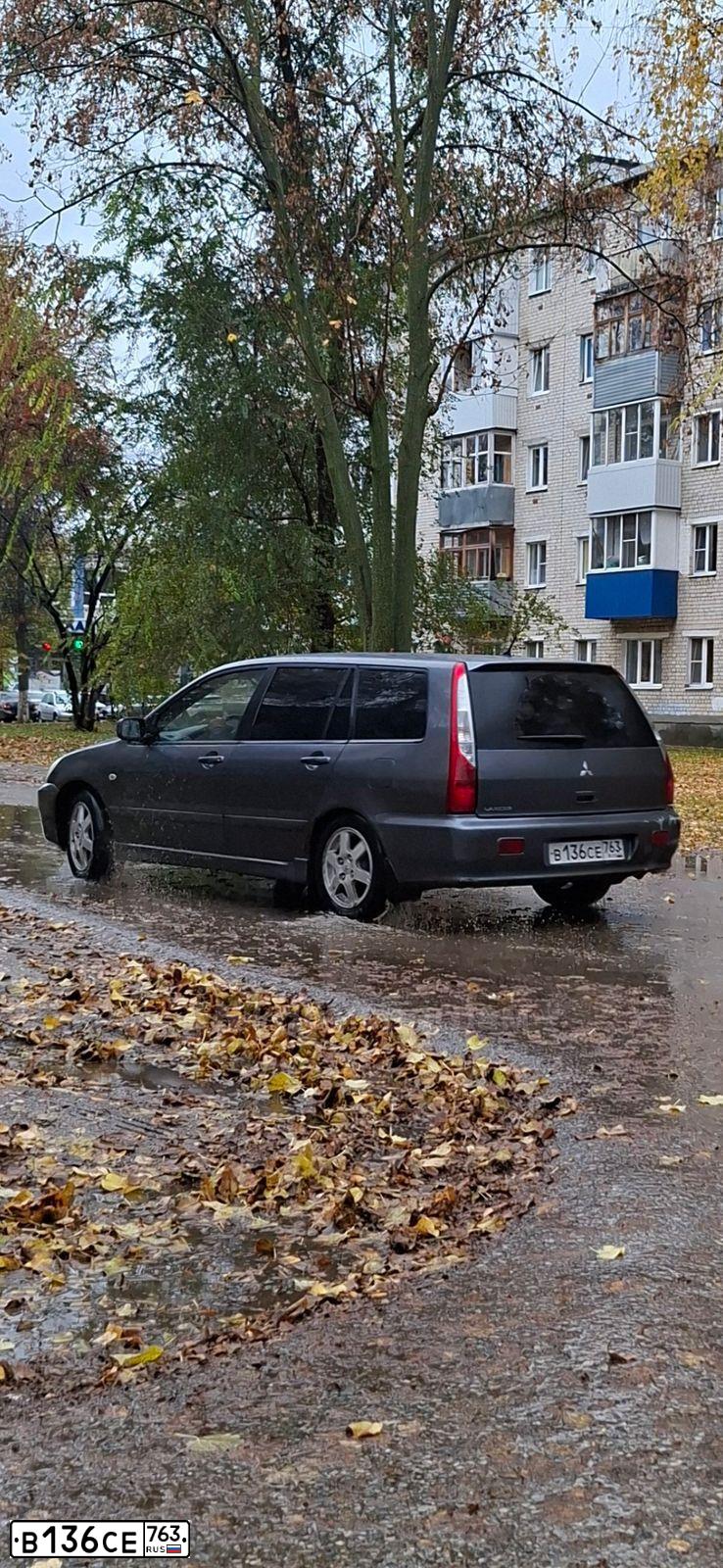 Фото автомобиля MITSUBISHI LANCER, 2006 — госномер А776МЕ199. Цвет: Серый
