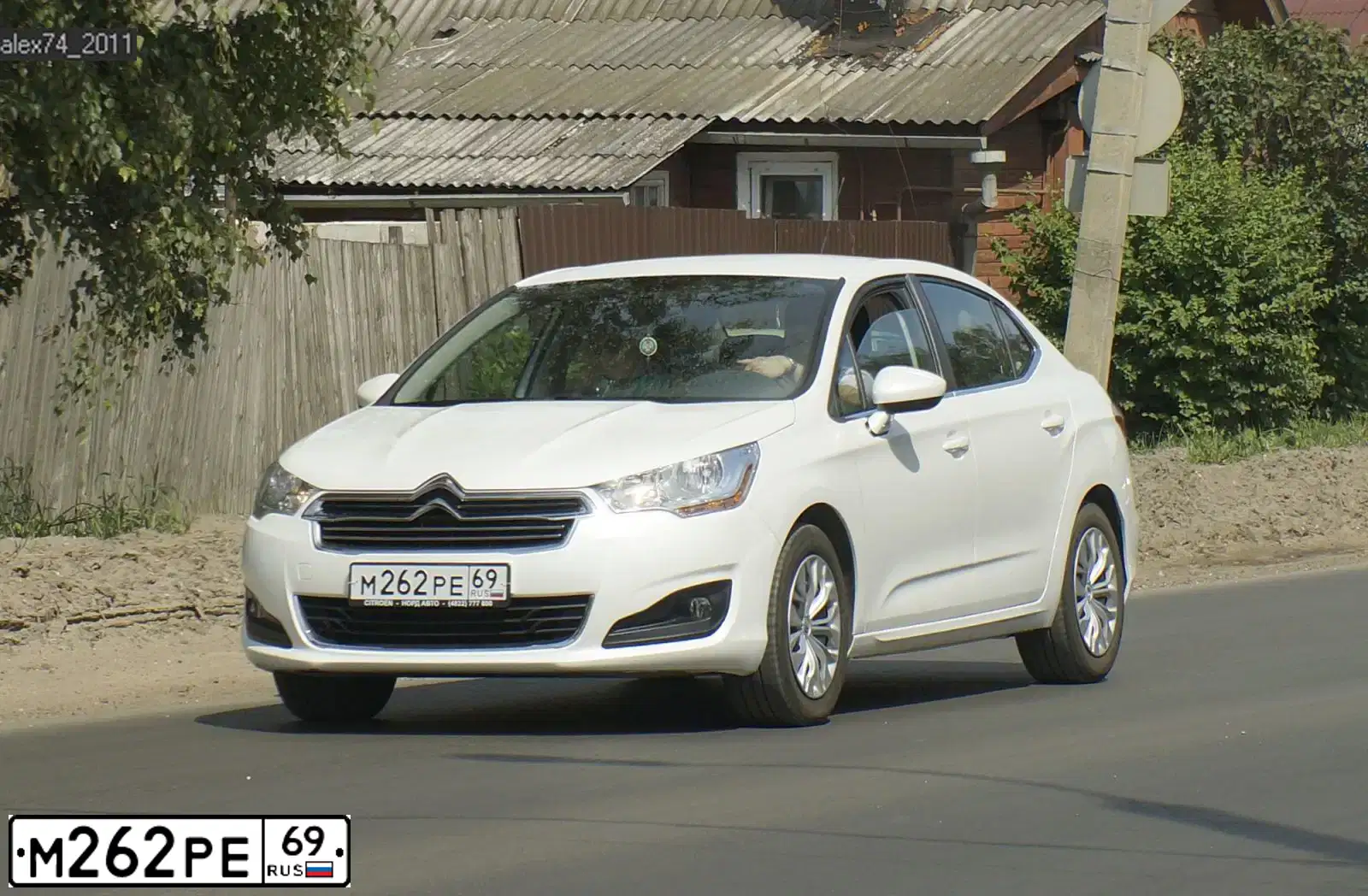 Фото автомобиля CITROEN C4, 2013 — госномер М262РЕ69. Цвет: Белый