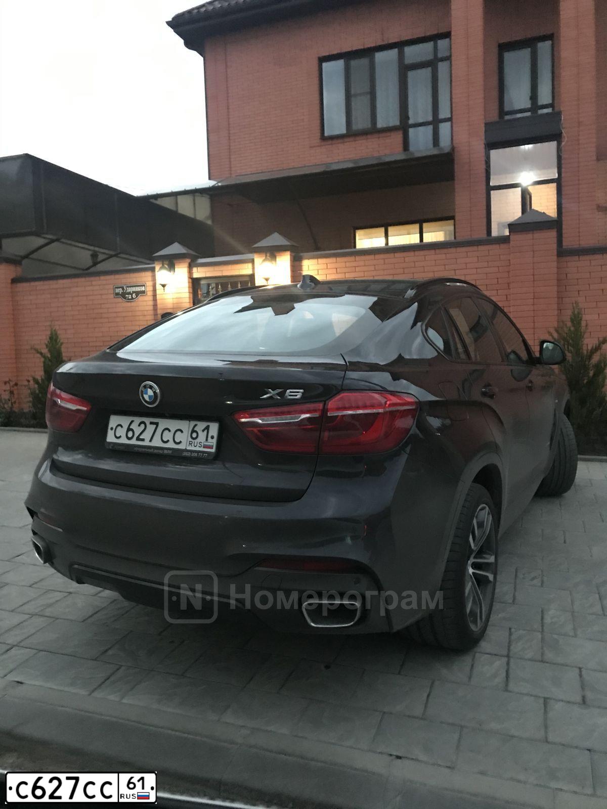 Фото автомобиля BMW SERIE 5, 2010 — госномер Е128МЕ11. Цвет: ЗЕЛЕНЫЙ