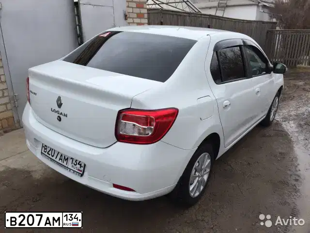 Фото автомобиля RENAULT LOGAN, 2014 — госномер Е200ЕС134. Цвет: Белый
