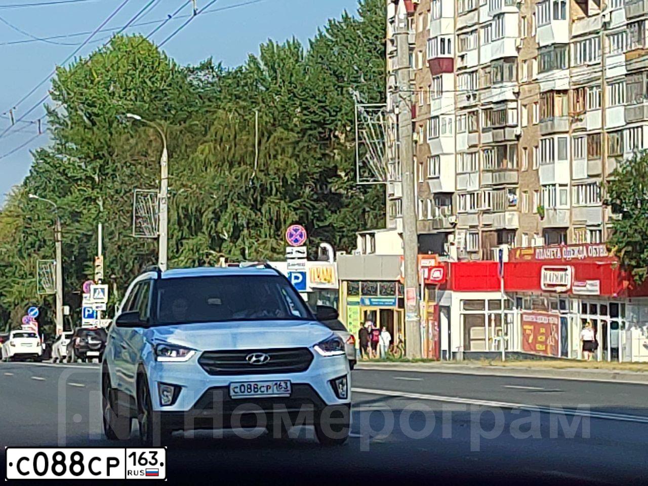 Фото автомобиля HYUNDAI IX35, 2012 — госномер А727СМ763. Цвет: Коричневый
