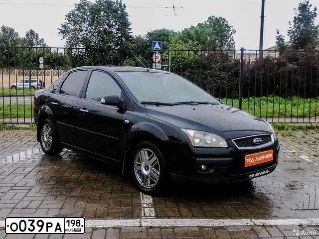 Фото автомобиля FORD FOCUS, 2007 — госномер М724МА21. Цвет: ЧЕРНЫЙ
