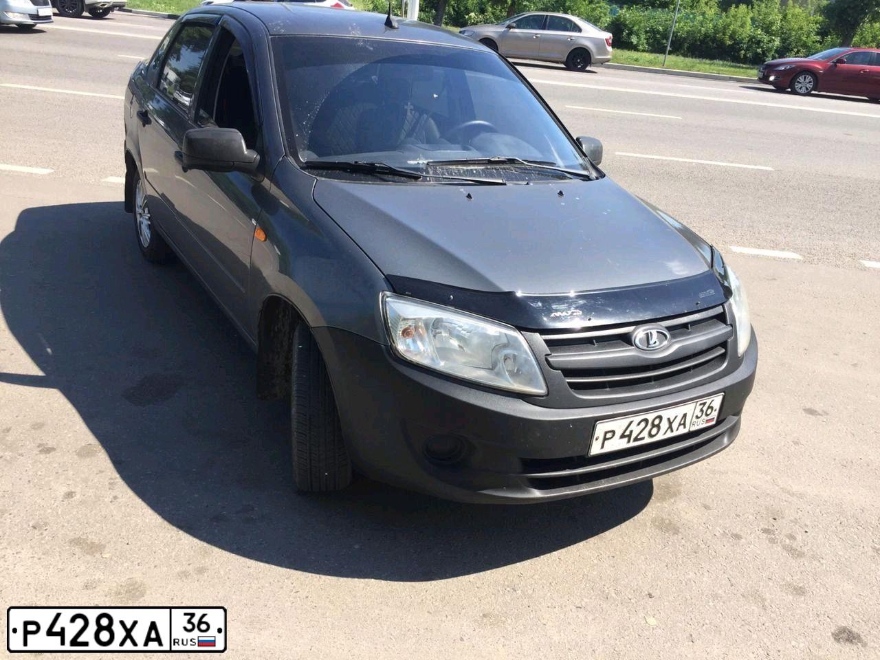 Фото автомобиля LADA 2190 GRANTA, 2013 — госномер Т866ЕК136. Цвет: СЕРЕБРИСТО-СЕРЫЙ