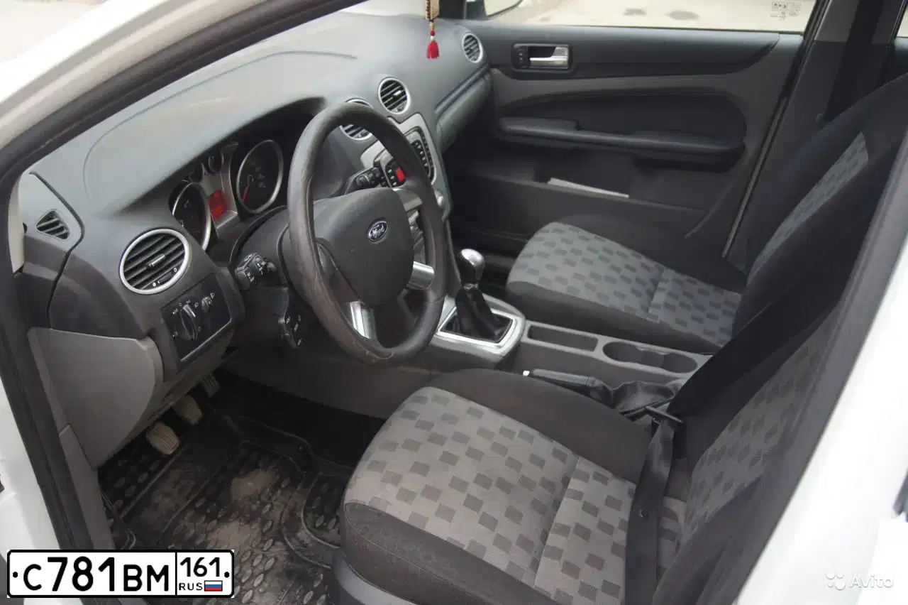 Фото автомобиля FORD FOCUS, 2008 — госномер Н787КА10. Цвет: Белый