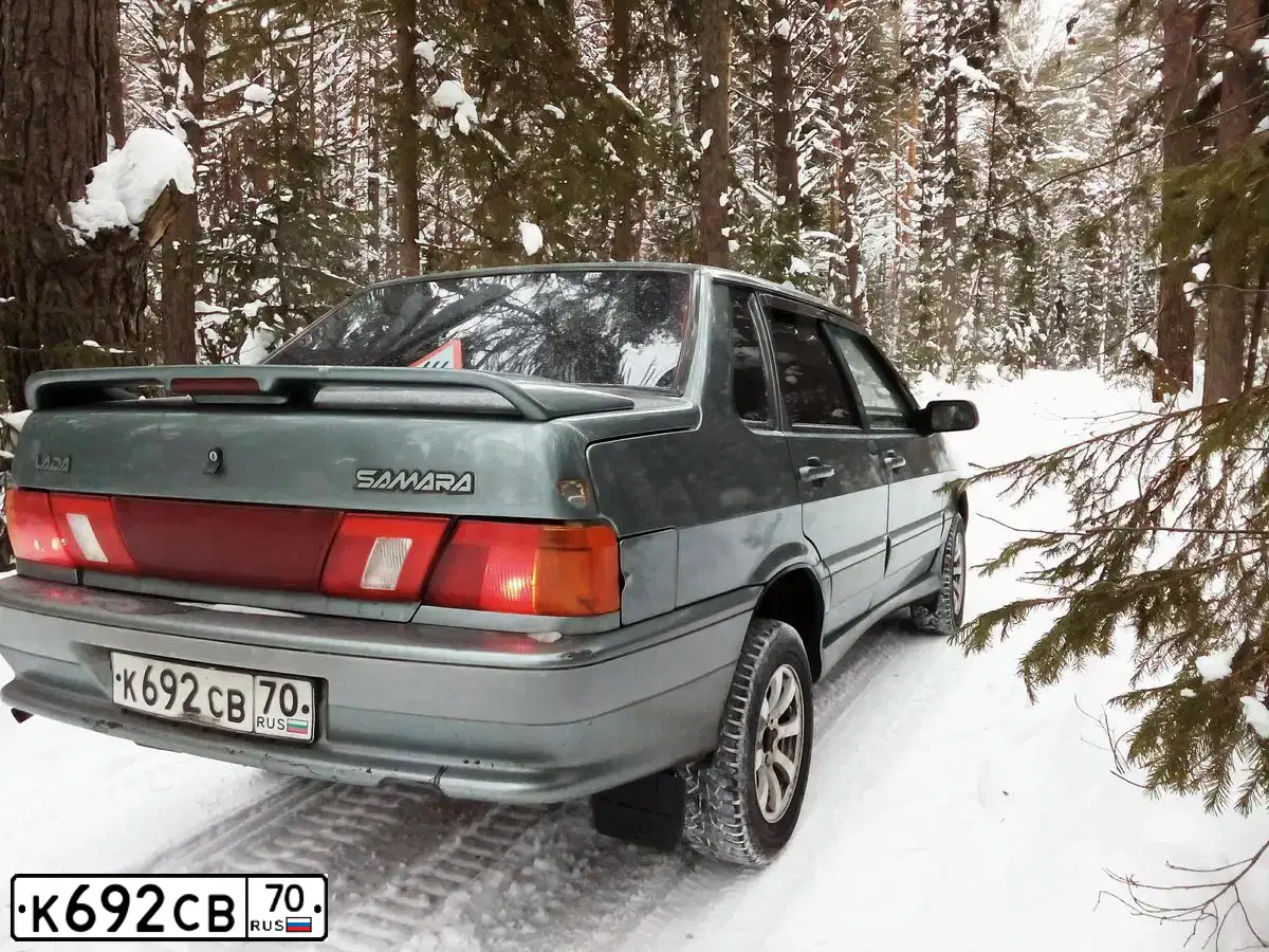 Фото автомобиля LADA 2115 SAMARA, 2005 — госномер К692СВ70. Цвет: СЕРО-ЗЕЛЕНЫЙ