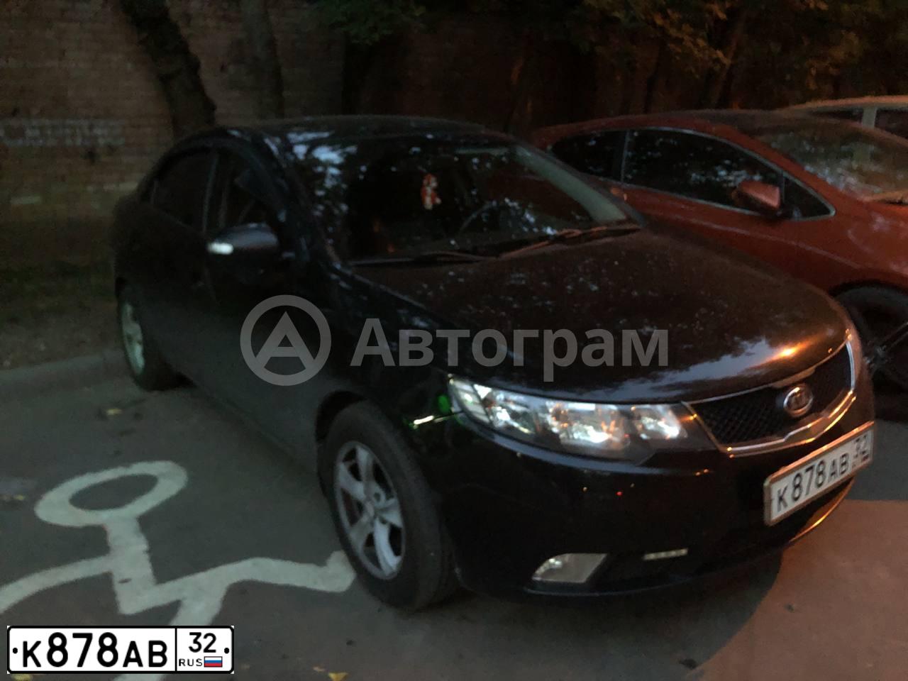 Фото автомобиля KIA CERATO, 2009 — госномер К878АВ32. Цвет: ЧЕРНЫЙ