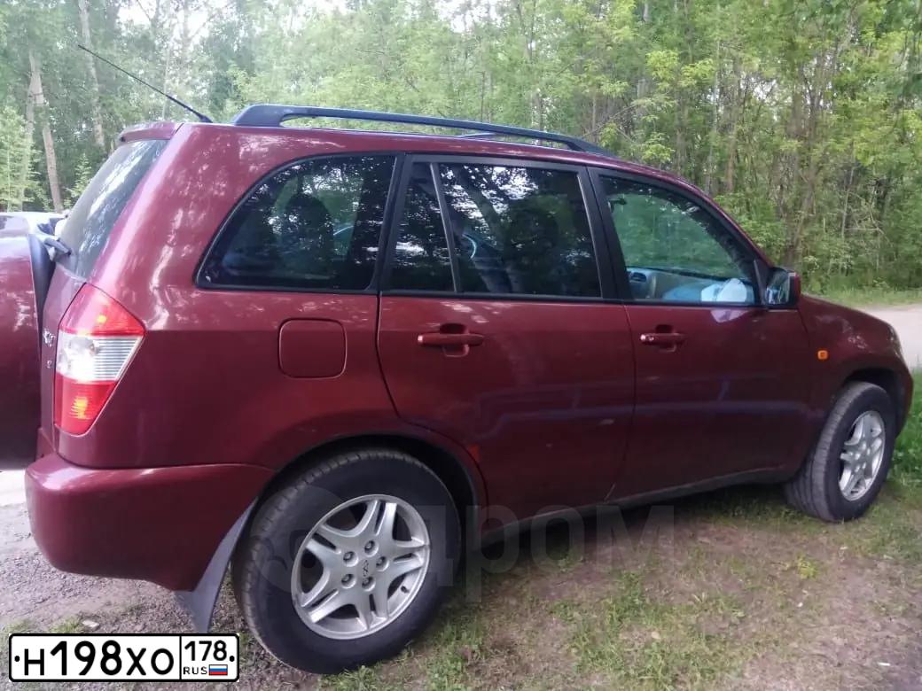 Фото автомобиля CHERY TIGGO, 2007 — госномер Н198ХО178. Цвет: Красный