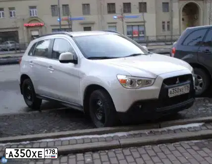 Фото автомобиля MITSUBISHI ASX, 2010 — госномер К169КО53. Цвет: Белый