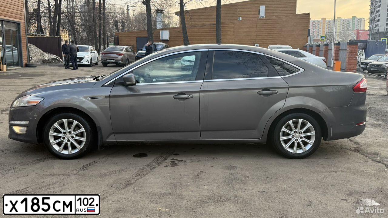 Фото автомобиля FORD MONDEO, 2011 — госномер Х185СМ102. Цвет: СЕРО-КОРИЧНЕВЫЙ