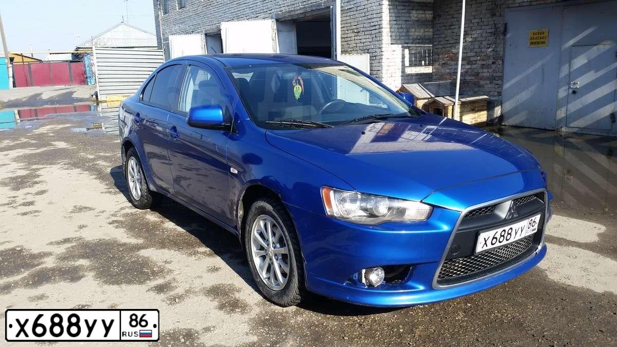 Фото автомобиля MITSUBISHI LANCER, 2011 — госномер А369ТТ174. Цвет: СИНИЙ