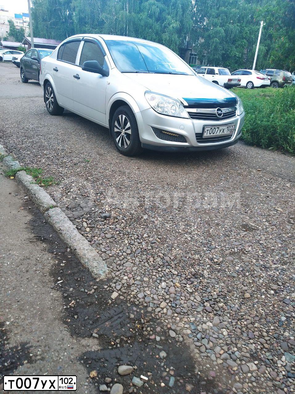 Фото автомобиля OPEL ASTRA, 2011 — госномер Т007УХ102. Цвет: СЕРЕБРИСТЫЙ