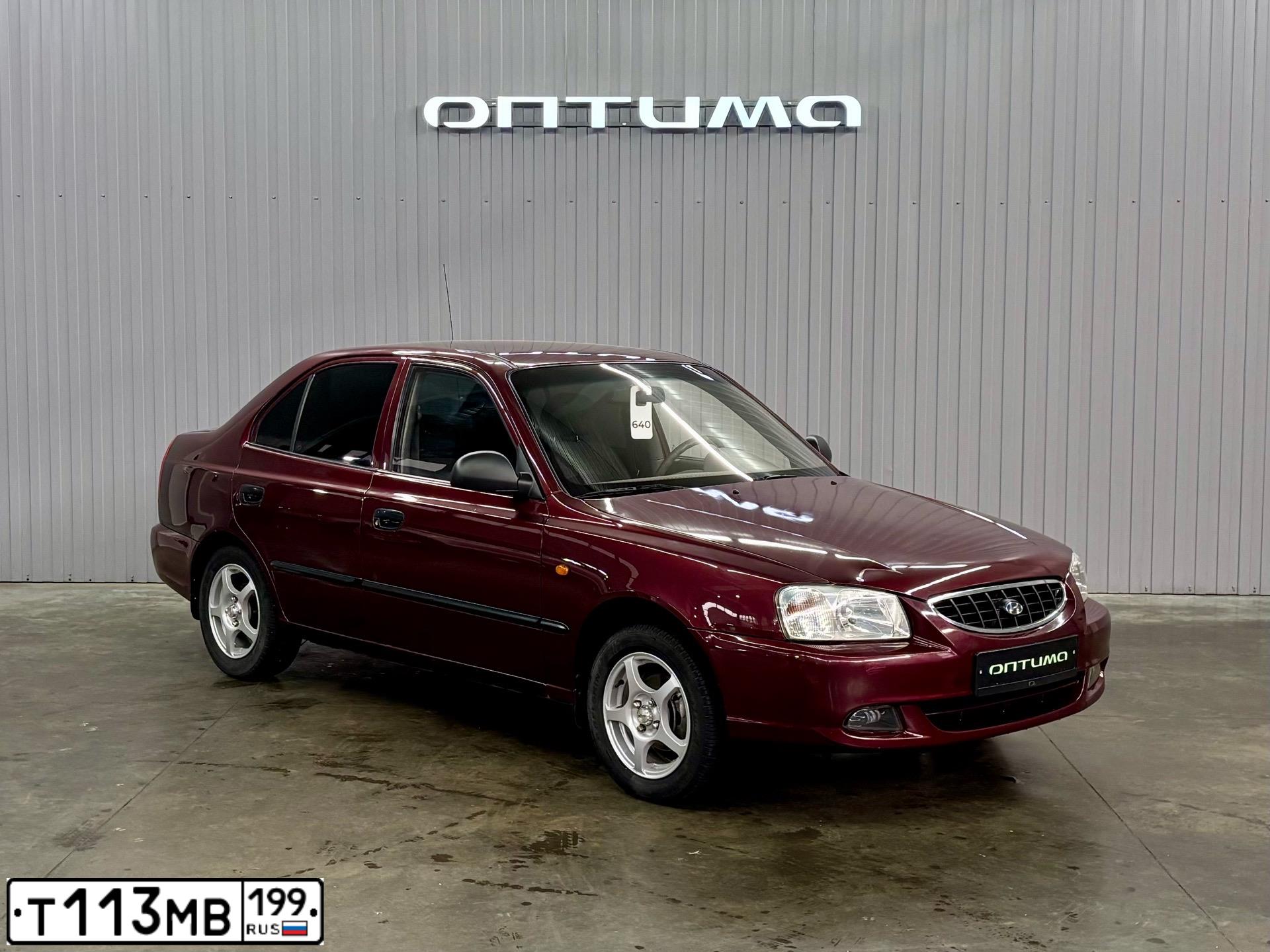 Фото автомобиля TAGAZ ACCENT, 2007 — госномер Т113МВ199. Цвет: Красный
