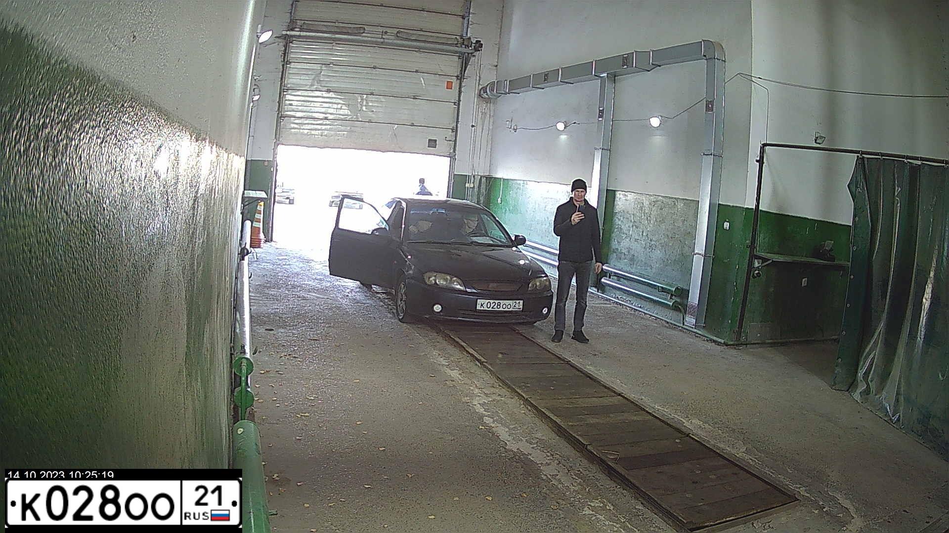Фото автомобиля KIA SPECTRA, 2008 — госномер К028ОО21. Цвет: Темно-синий