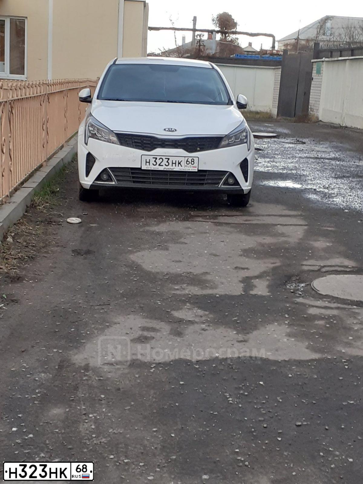 Фото автомобиля KIA RIO, 2015 — госномер О983СН68. Цвет: Белый