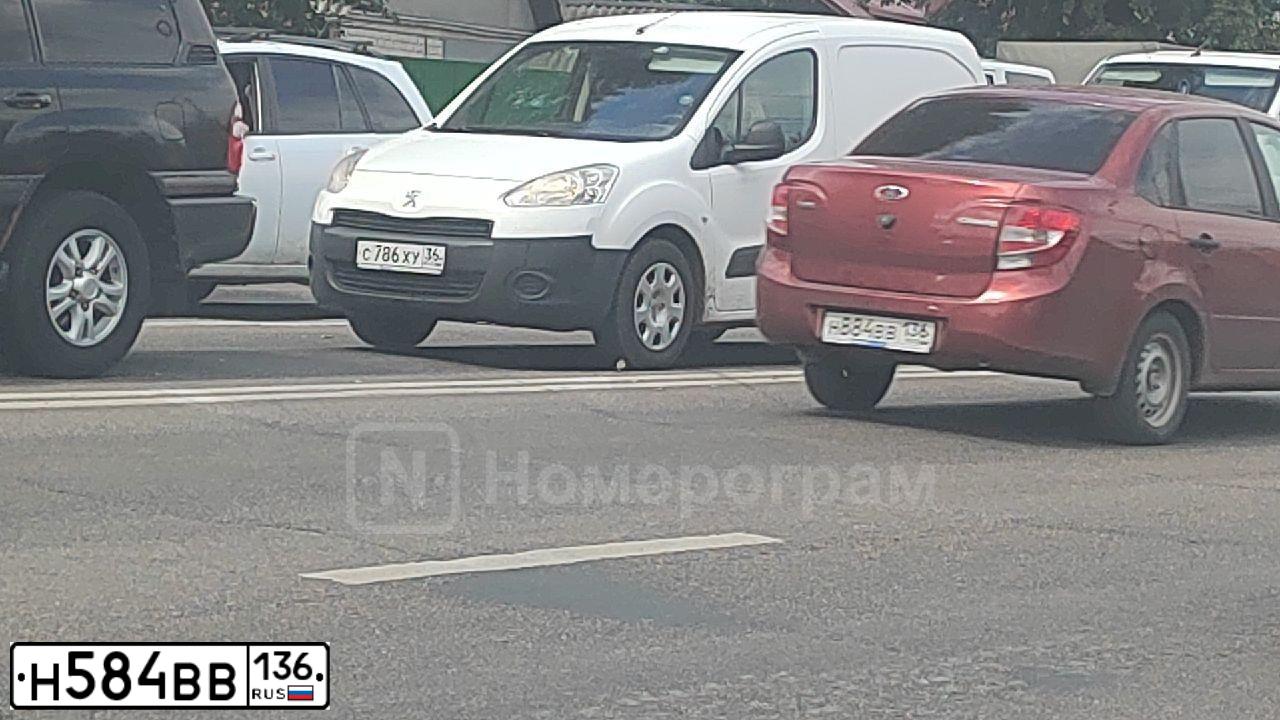 Фото автомобиля LADA 2190 GRANTA, 2018 — госномер Н584ВВ136. Цвет: Белый
