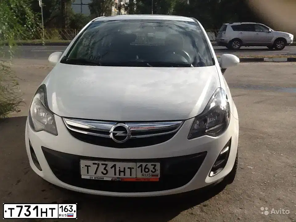 Фото автомобиля OPEL CORSA, 2013 — госномер Р597ОО58. Цвет: БЕЛЫЙ