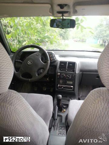 Фото автомобиля LADA 2112, 2004 — госномер Р952ВО123. Цвет: серебристо-бежевый