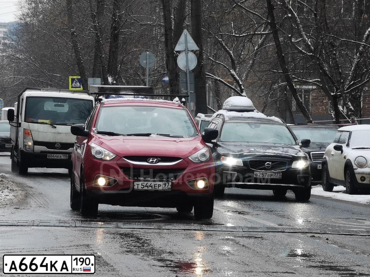 Фото автомобиля NISSAN CABSTAR, 2010 — госномер О026НР797. Цвет: БЕЛЫЙ