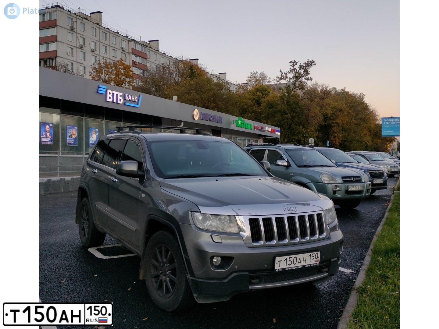 Фото автомобиля JEEP GRAND CHEROKEE, 2012 — госномер Т150АН150. Цвет: СЕРЫЙ