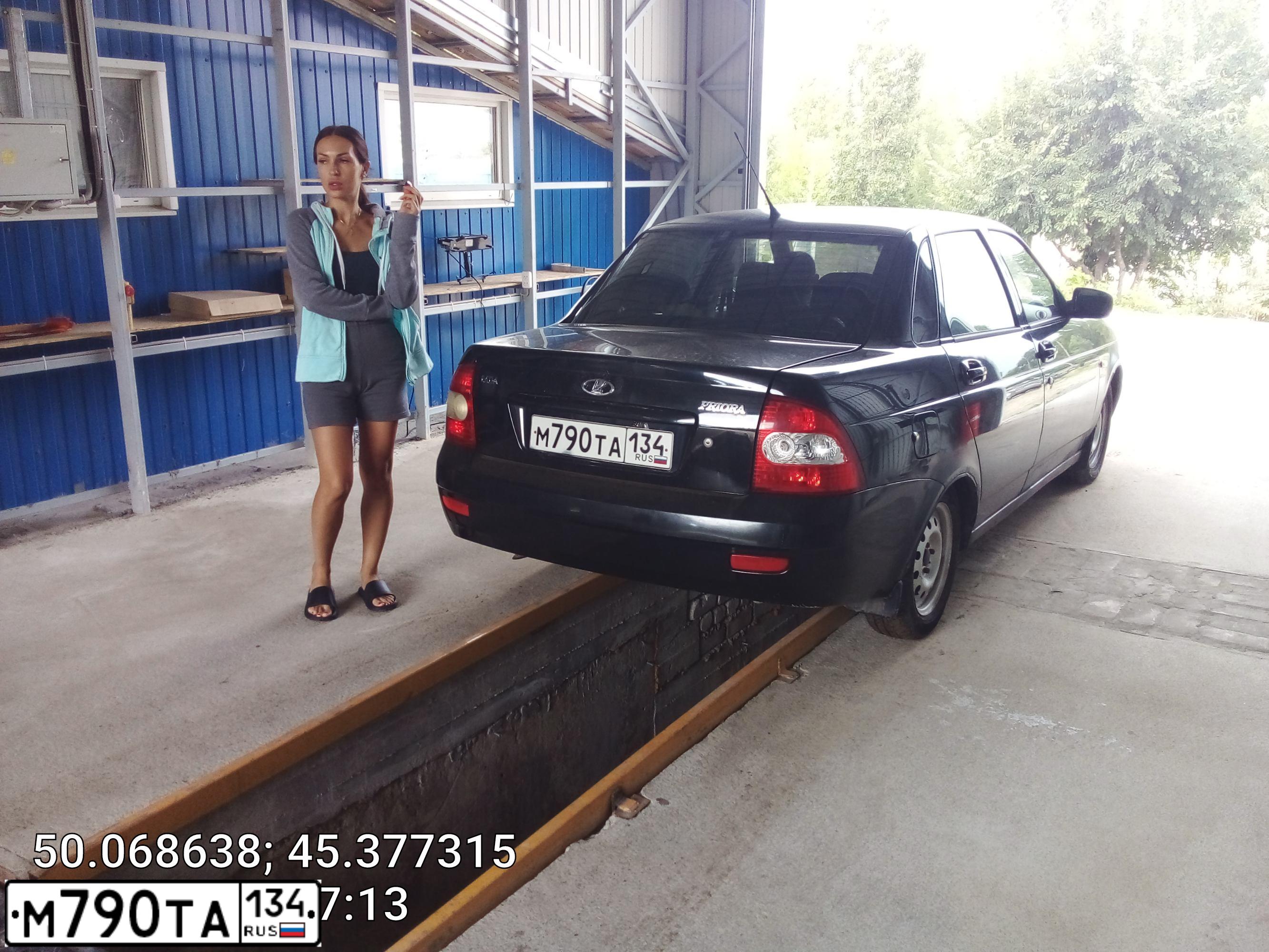 Фото автомобиля LADA 217030 LADA PRIORA, 2009 — госномер М121ТТ134. Цвет: СИНЕ-ЧЕРНЫЙ