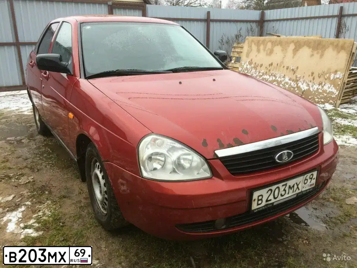 Фото автомобиля LADA PRIORA, 2008 — госномер Е128ТР69. Цвет: ЗОЛОТИСТО-КРАСНЫЙ