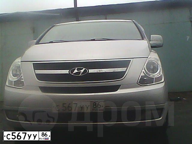Фото автомобиля HYUNDAI GRAND STAREX, 2008 — госномер Р072МР82. Цвет: СЕРЫЙ