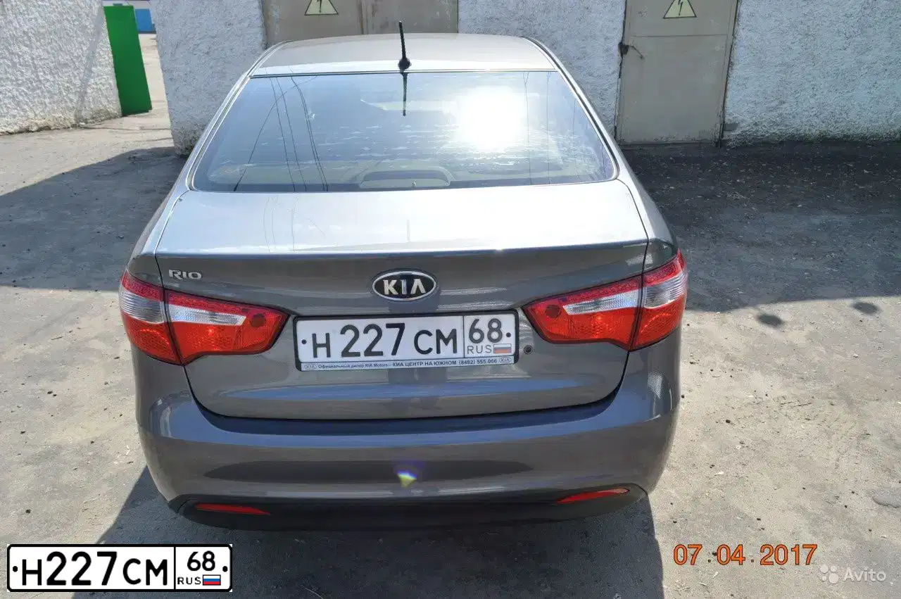 Фото автомобиля KIA RIO, 2012 — госномер Н227СМ68. Цвет: СЕРЫЙ