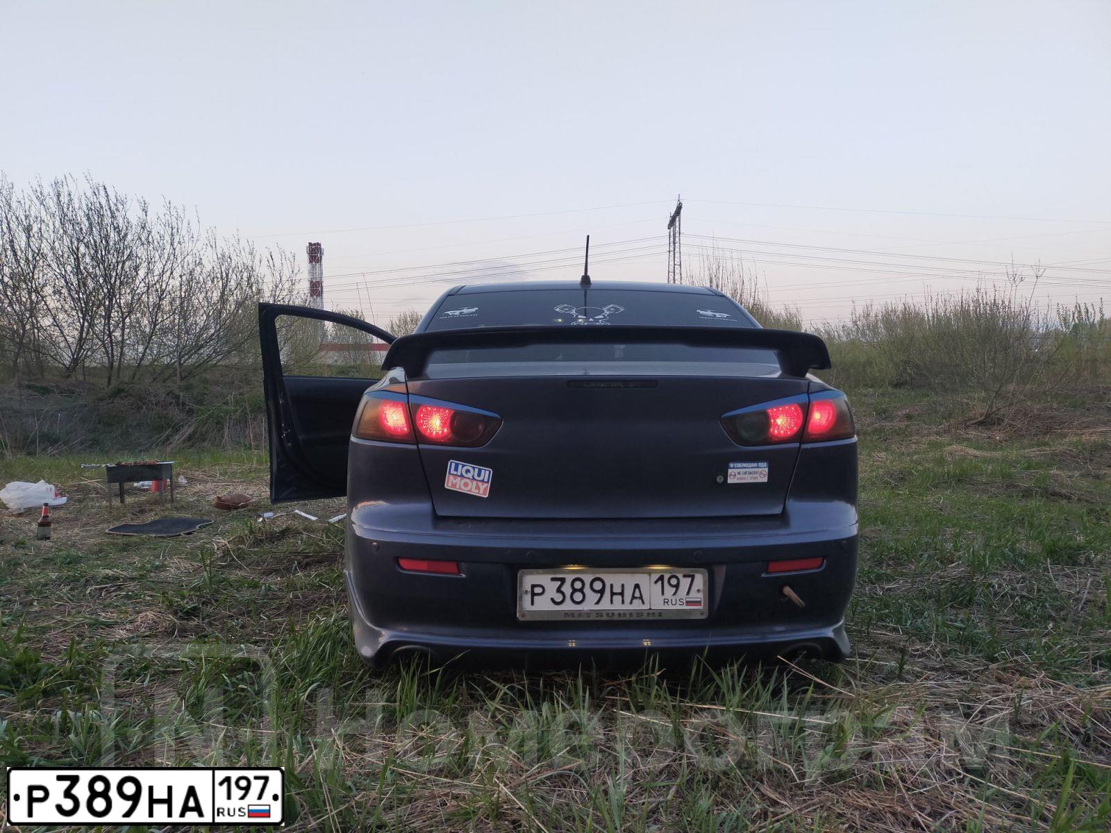 Фото автомобиля MITSUBISHI LANCER, 2008 — госномер Р389НА197. Цвет: ЧЕРНЫЙ