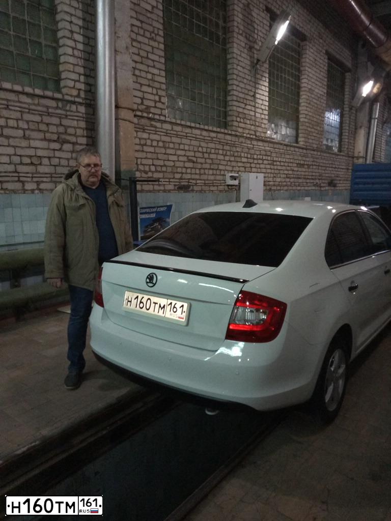 Фото автомобиля SKODA RAPID, 2014 — госномер О686МХ134. Цвет: Белый