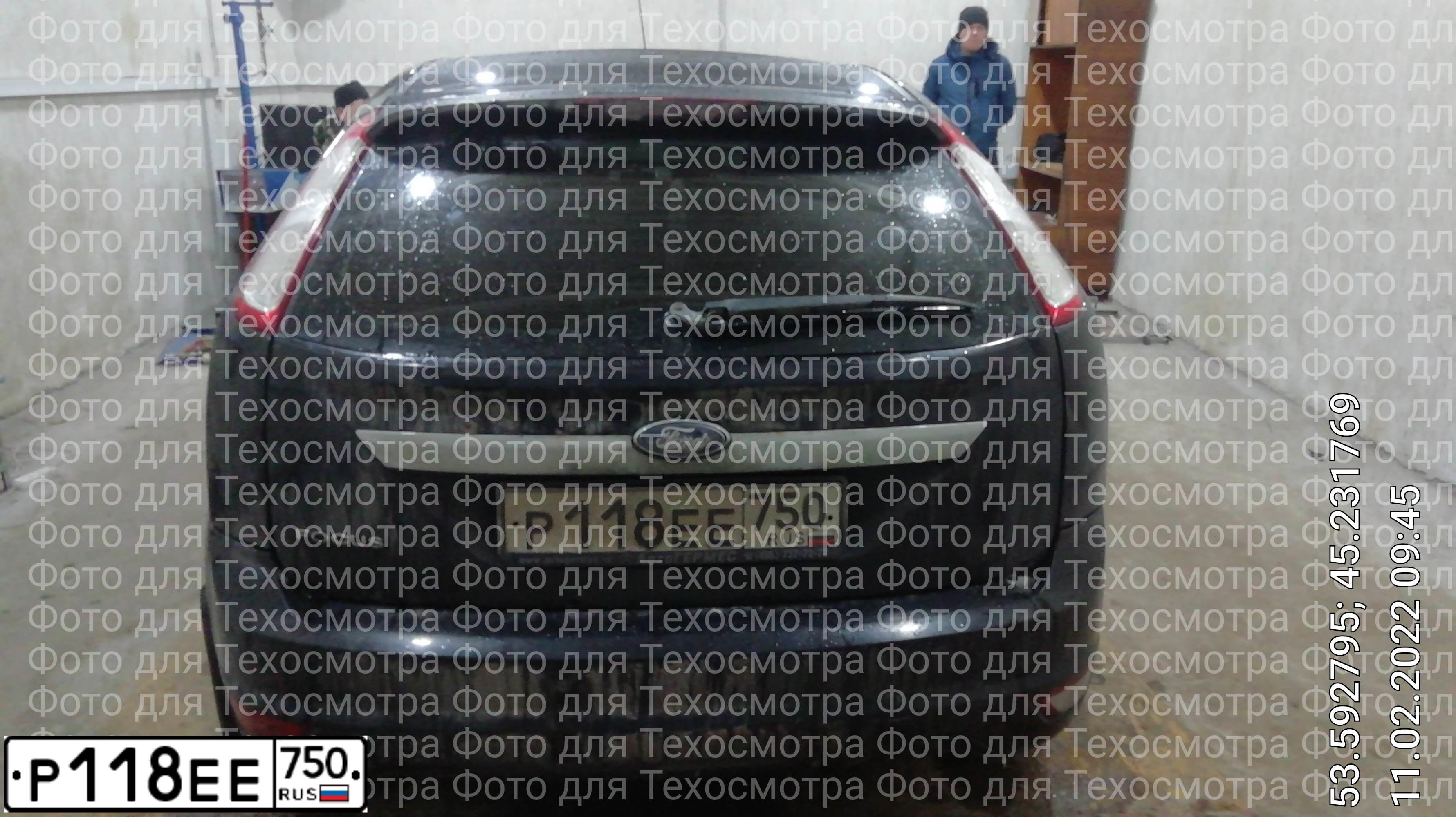 Фото автомобиля FORD D FOCUS, 2009 — госномер Р118ЕЕ750. Цвет: ЧЕРНЫЙ