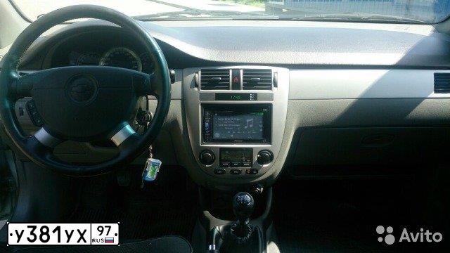 Фото автомобиля CHEVROLET LACETTI, 2005 — госномер Е855ОЕ82. Цвет: СЕРО-ЗЕЛЕНЫЙ