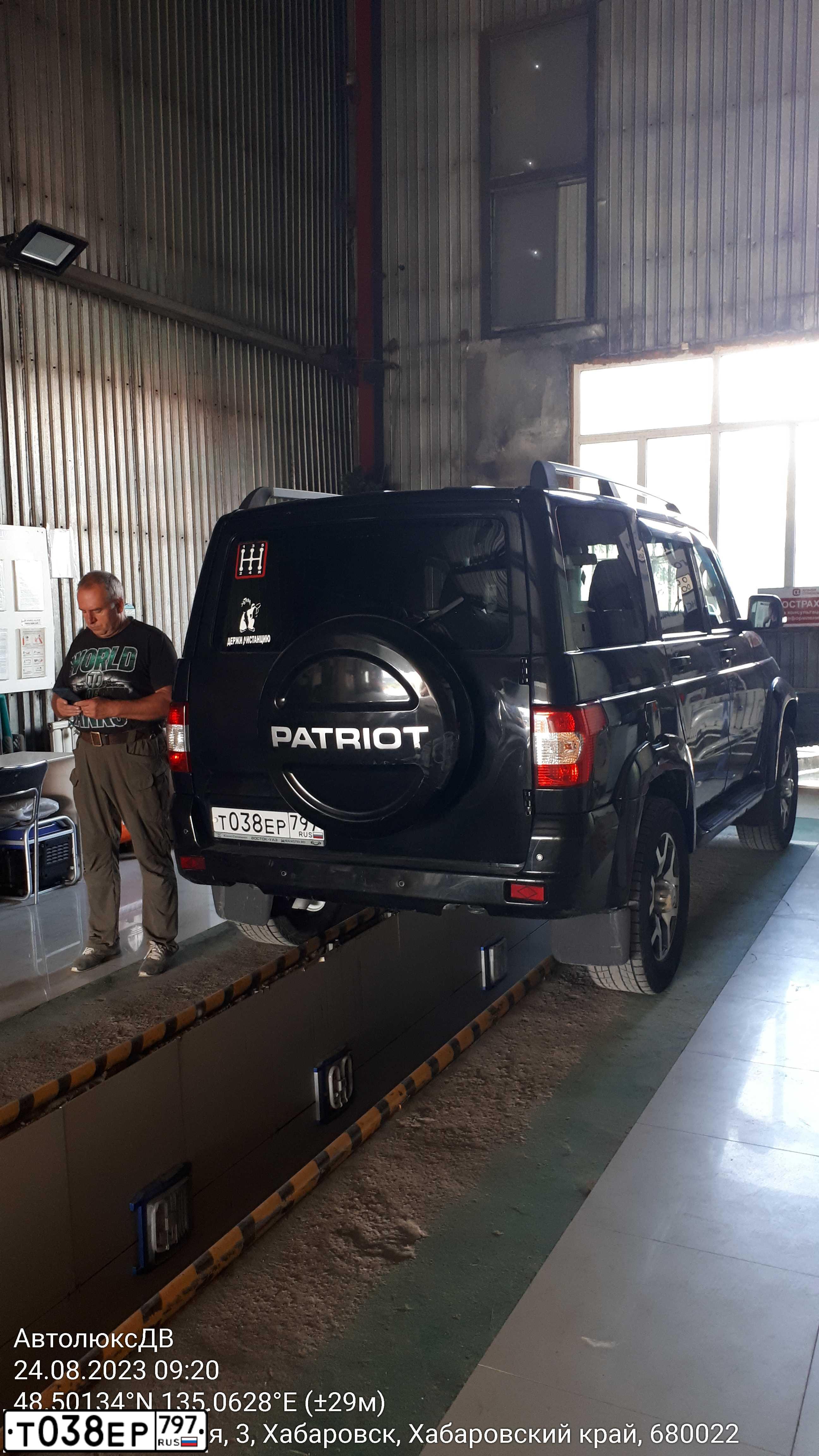 Фото автомобиля UAZ Z 3163 PATRIOT, 2019 — госномер Т038ЕР797. Цвет: ЧЕРНЫЙ МЕТАЛИК