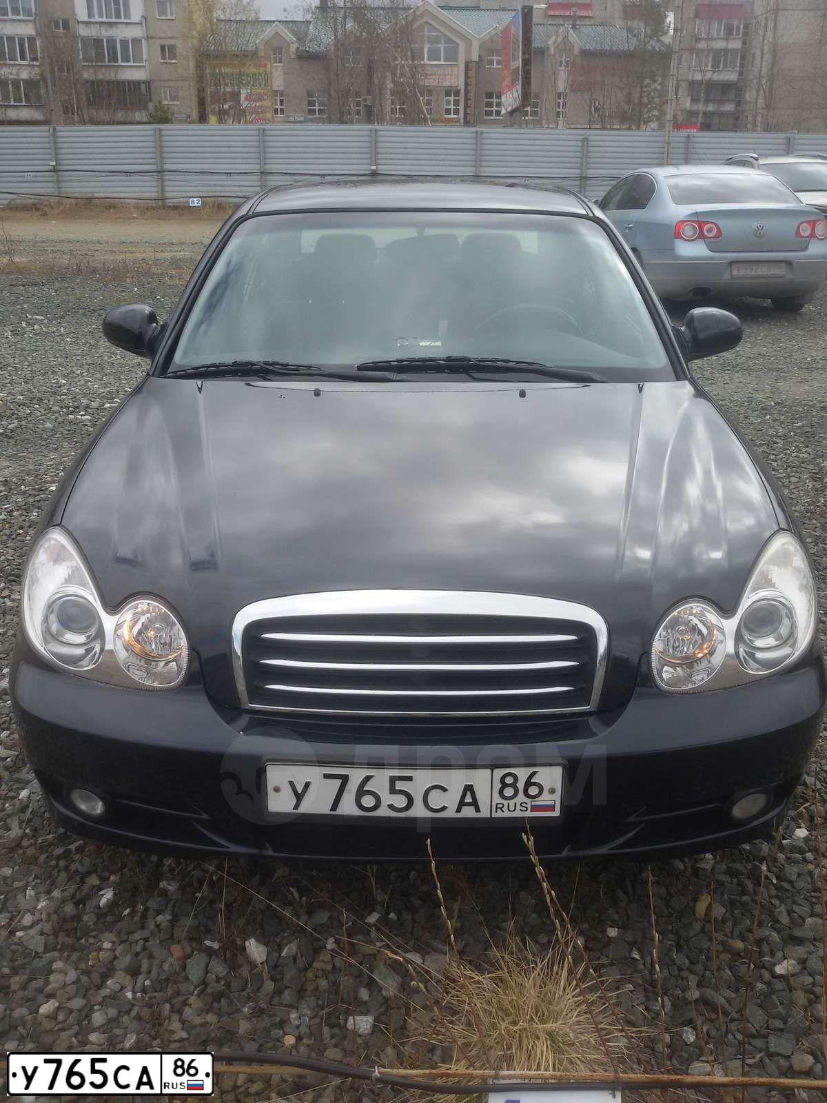 Фото автомобиля TAGAZ SONATA, 2007 — госномер Е893МВ186. Цвет: ЧЕРНЫЙ