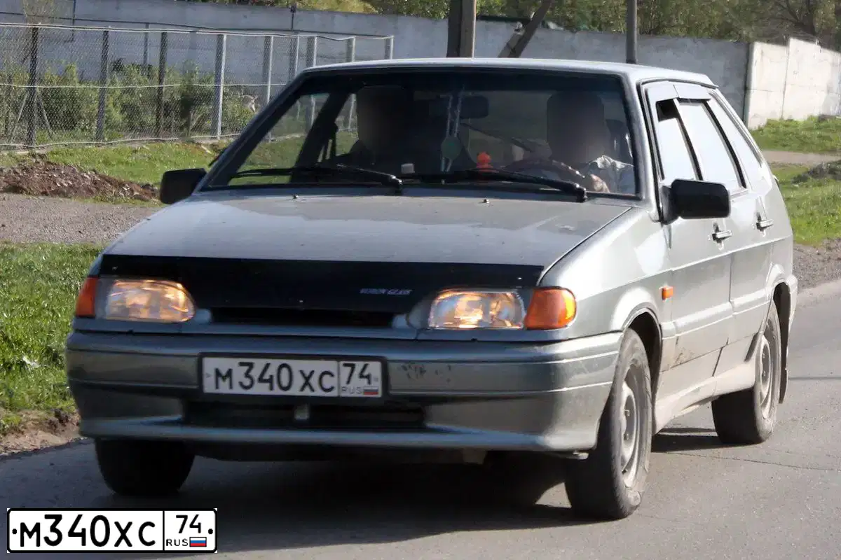 Фото автомобиля LADA 2114 SAMARA, 2006 — госномер М340ХС74. Цвет: СЕРО-ЗЕЛЕНЫЙ