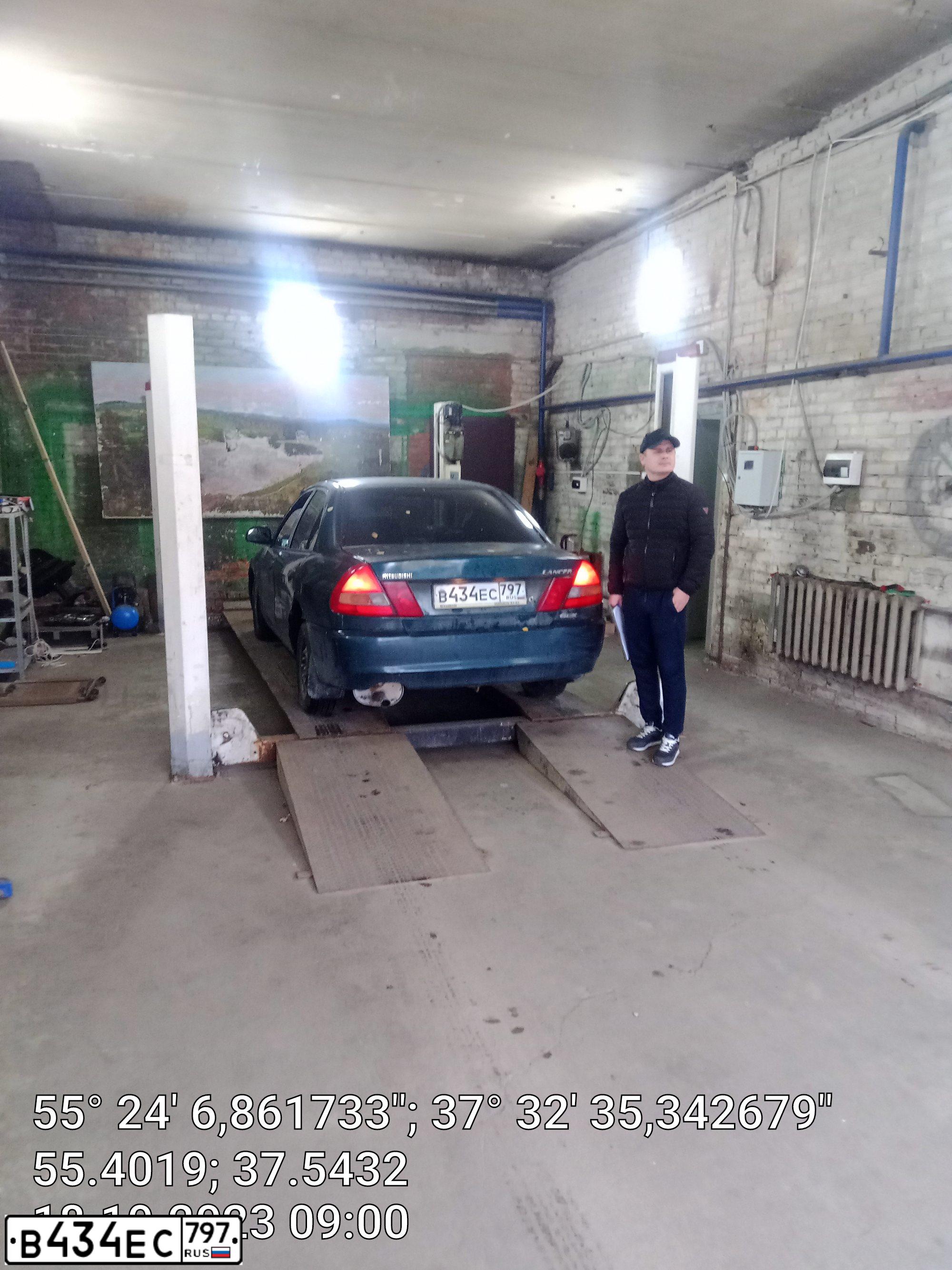 Фото автомобиля MITSUBISHI LANCER, 1997 — госномер В434ЕС797. Цвет: ЗЕЛЕНЫЙ