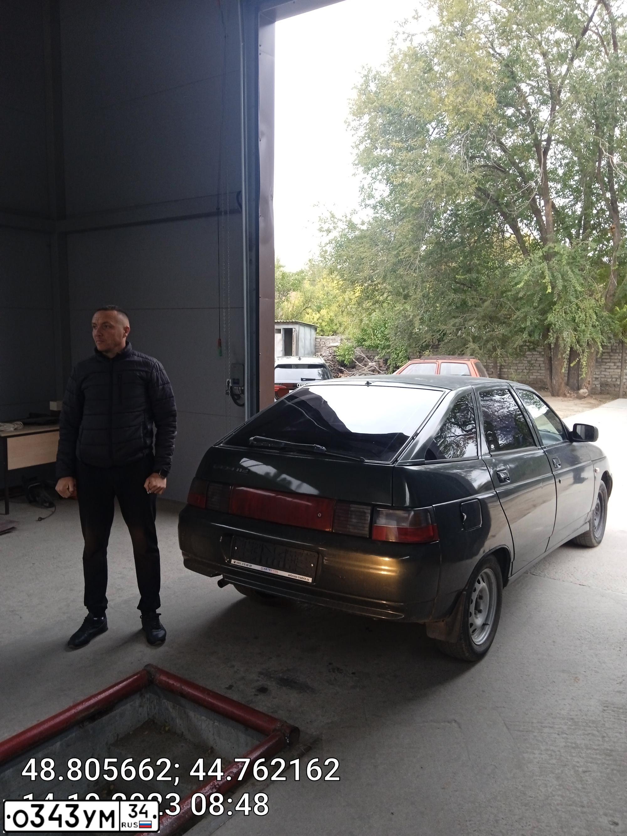 Фото автомобиля LADA 2112 LADA, 2004 — госномер О343УМ34. Цвет: ЗОЛОТИСТО-ТЕМНО-ЗЕЛЕНЫЙ