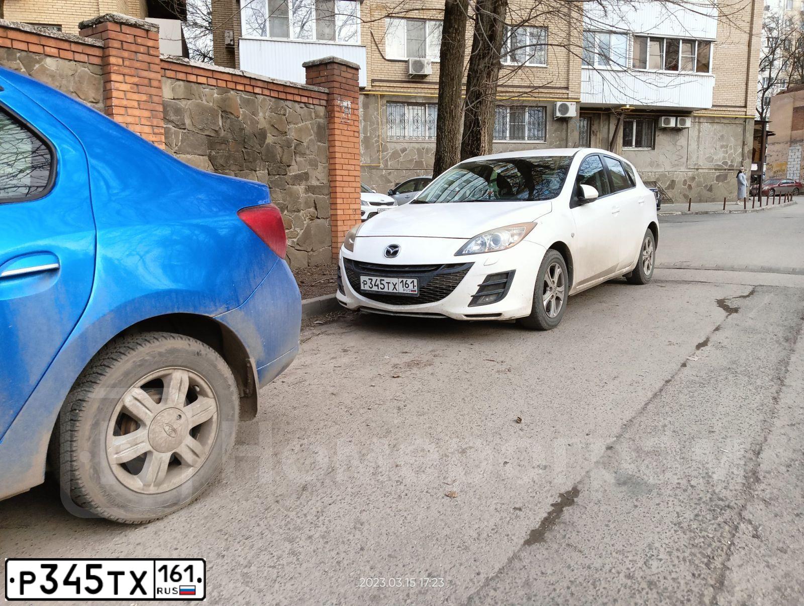 Фото автомобиля MAZDA 3, 2011 — госномер Т131НМ161. Цвет: Белый
