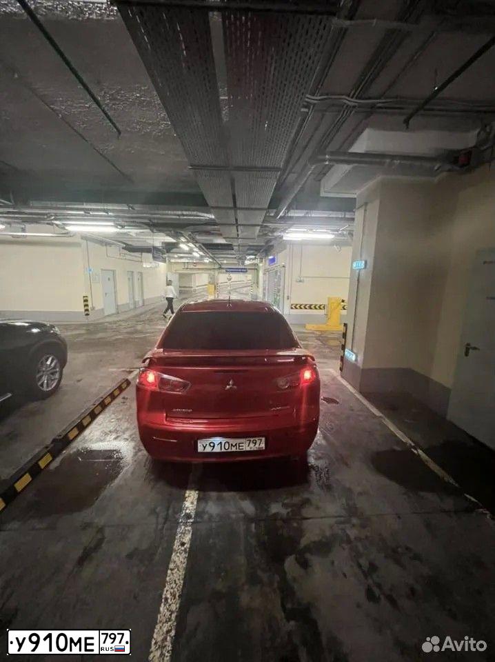 Фото автомобиля MITSUBISHI LANCER, 2011 — госномер О576НР142. Цвет: Красный