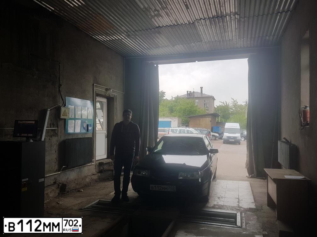 Фото автомобиля LADA 2112, 2008 — госномер В112ММ702. Цвет: ЧЕРНЫЙ МЕТАЛИК
