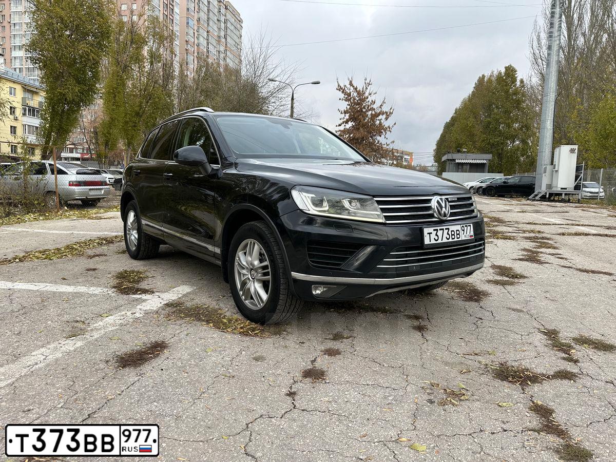 Фото автомобиля VOLKSWAGEN TOUAREG, 2015 — госномер Т373ВВ977. Цвет: ЧЕРНЫЙ