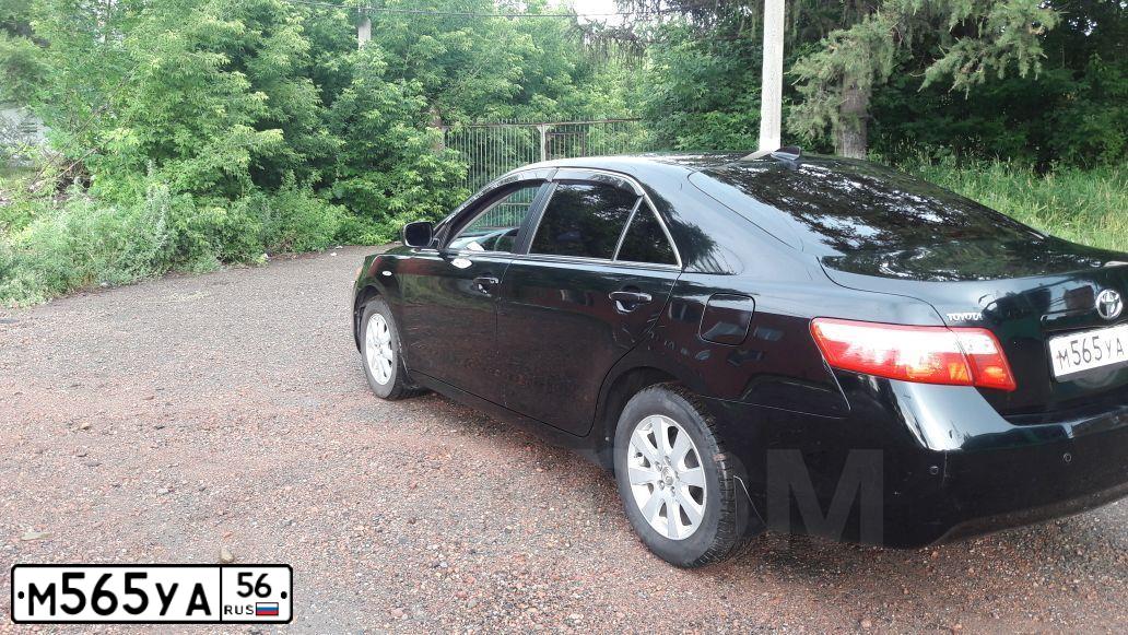 Фото автомобиля LADA 2107, 2005 — госномер М565УА56. Цвет: Темно-зеленый