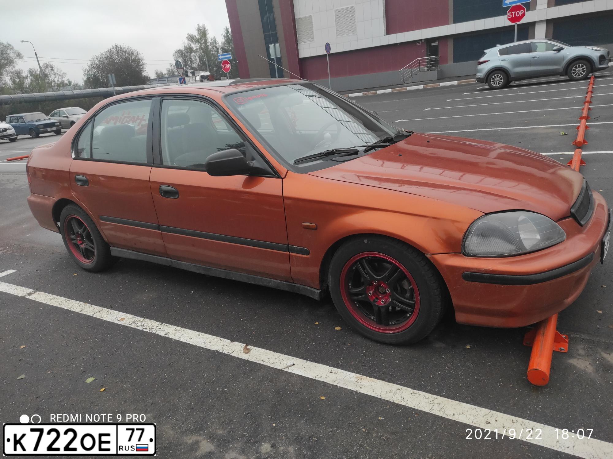 Фото автомобиля HONDA CIVIC, 1997 — госномер А841КЕ797. Цвет: Оранжевый