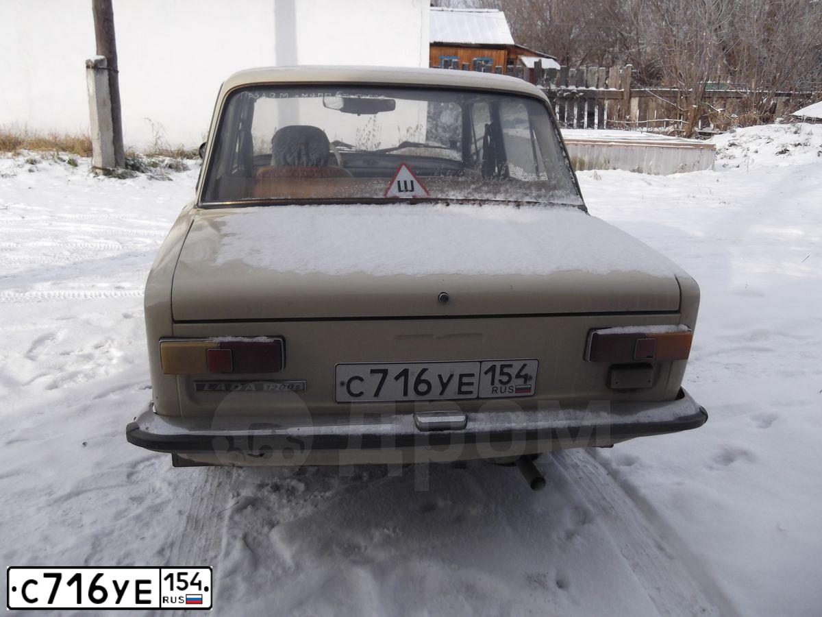 Фото автомобиля LADA 2101 LADA, 1982 — госномер С716УЕ154. Цвет: БЕЖЕВЫЙ