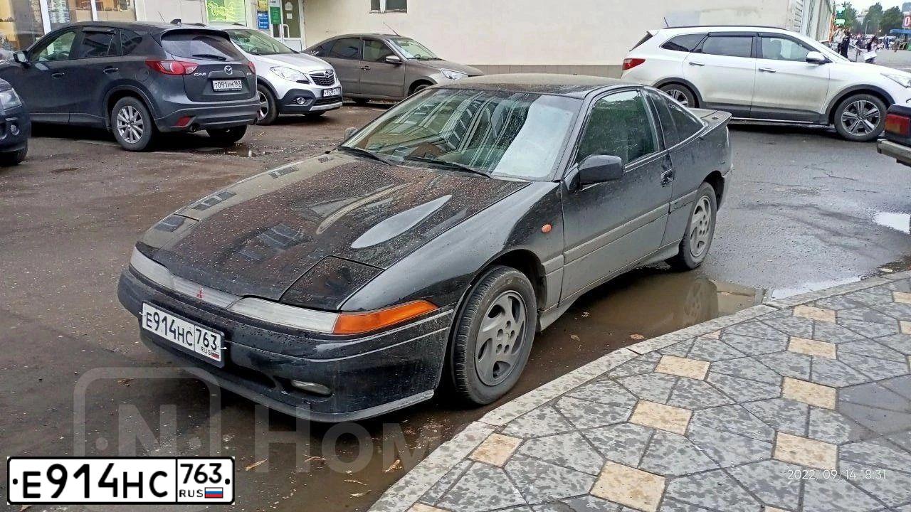 Фото автомобиля MITSUBISHI ECLIPSE, 1993 — госномер С035МС18. Цвет: ЧЕРНЫЙ