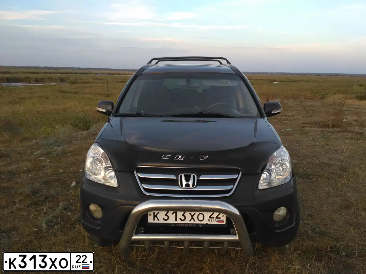 Фото автомобиля HONDA CR-V, 2004 — госномер О991НС154. Цвет: ЧЕРНЫЙ